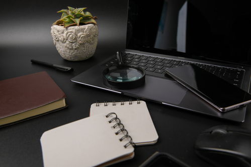 放大镜便签本办公用品商务摄影图 摄影